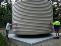 Tank being positioned by crane